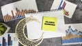 Concept of Islamic Banking write on sticky notes isolated on Wooden Table Royalty Free Stock Photo