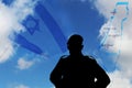 Concept: Israel Defense Forces IDF, Tzahal: silhouette of an Israeli soldier against a blurred blue sky with the flag and map Royalty Free Stock Photo