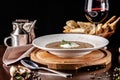 The concept of Italian cuisine. Mushroom soup mashed mushrooms with cream and spices, with olive oil, glass of red wine Royalty Free Stock Photo