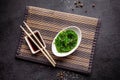 The concept of Japanese and Chinese cuisine. Chuka Salad, made from seaweed, sesame, olive oil and spices. soy sauce Royalty Free Stock Photo