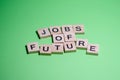 Concept of jobs of the future. Selective focus on Inscription jobs of future on blurred background. Banner on green background