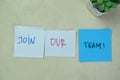 Concept of Join Our Team! write on sticky notes isolated on Wooden Table Royalty Free Stock Photo