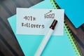 Concept of 401k Rollovers write on sticky notes isolated on Wooden Table Royalty Free Stock Photo