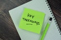 Concept of Key Takeaways write on sticky notes isolated on Wooden Table Royalty Free Stock Photo