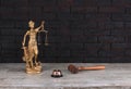 law, Themis and judicial gavel Royalty Free Stock Photo