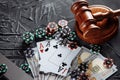 Concept of legal regulation of gambling, justice gavel and dice on the background of an old grey table Royalty Free Stock Photo