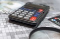 The concept of lending. Money, calculator, magnifier. Royalty Free Stock Photo