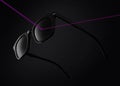 Concept of lenses that protect from ultraviolet rays, sunglasses isolated on black background filter sunlight uv ray , with purple