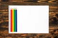 Colored pencils painted in LGBT colors and white card Royalty Free Stock Photo