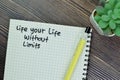 Concept of Life Your Life Without Limits write on book isolated on Wooden Table