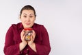 The concept of lifestyle and food. Delighted happy woman looking surprised, receiving her favorite sweets, such as eating sweets,