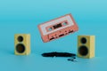 the concept of listening to music. an old audio cassette, cord and speakers on a turquoise background. 3D render Royalty Free Stock Photo