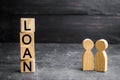 The concept of `Loan`. Businessmen are discussing questions about the company`s loans. The financial loans between the lender and