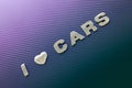 Concept of love of cars, motoracing. Letters on carbon fiber background Royalty Free Stock Photo
