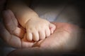 Concept of love and family. hands of mother and baby. Royalty Free Stock Photo