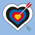 An arrow pierces a heart-shaped target show Royalty Free Stock Photo