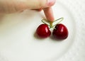 The concept of love - heart from berries of a sweet cherry.Isolated cherry. Heart shape from two cherries isolated white Royalty Free Stock Photo