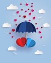 Twin heart under blue umbrella floating on the sky with cloud