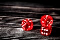 Concept luck - dice gambling on dark wooden background Royalty Free Stock Photo