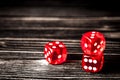 Concept luck - dice gambling on dark wooden background Royalty Free Stock Photo