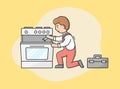 Concept Of Master Call, Appliances Service. Professional Worker Repairman Fixes Gas Stove Oven. Character Repairs Broken Royalty Free Stock Photo