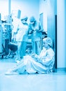 Concept of medecine surgery, Kovid 19. Tired, exhausted doctor after an exhausting shift in the intensive care unit Royalty Free Stock Photo