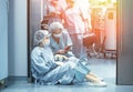 Concept of medecine surgery, Kovid 19. Tired, exhausted doctor after an exhausting shift in the intensive care unit Royalty Free Stock Photo