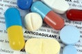 The word anticoagulant written in French surrounded by various drugs in close-up