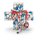 Concept of medicine. Cross from drugs and stethoscope.