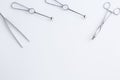 Concept for medicine. Vintage surgical instruments on white isolated background.