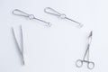 Concept for medicine. Vintage surgical instruments on white isolated background.