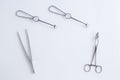 Concept for medicine. Vintage surgical instruments on white isolated background.