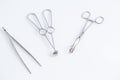 Concept for medicine. Vintage surgical instruments on white isolated background.