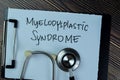 Concept of Meylodysplastic Syndrome write on paperwork with stethoscope isolated on Wooden Table