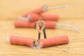 Concept miniature people destroying a Firecracker Royalty Free Stock Photo