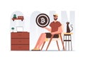 The concept of mining and extraction of bitcoin. The guy sits in a chair and holds a bitcoin in the form of a coin in