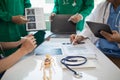 concept of mobilizing ability of medical team in conference room to diagnose and treat disease correctly. medical team joins Royalty Free Stock Photo