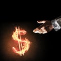 Concept of money making with dollar currency fire symbol on dark