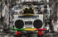 The concept of the music Hip hop style.Vintage audio player with headphones.Skateboard ,fashionable cap and sunglasses.