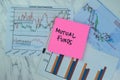 Concept of Mutual Funds write on sticky notes isolated on Wooden Table Royalty Free Stock Photo