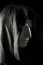 Concept mysterious portrait monk pastor gypsum head in hooded cape Royalty Free Stock Photo