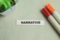 Concept of Narrative write on sticky notes isolated on Wooden Table