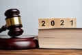 The concept of new laws in 2021 next to the judge hammer