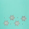 Concept for New Year or Christmas. Four Beautiful wooden snowflakes