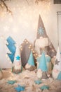 The concept of the New Year holidays. Many dwarfs with Christmas trees in a decorated Christmas room close-up and copy space