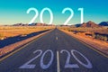 Concept for new year 2021.The word 2020 written on American highway road in the middle of empty asphalt road in California Royalty Free Stock Photo