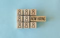 Concept is now hiring. Abstract staff icons on dice. Royalty Free Stock Photo