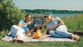 The concept of old age and outdoor recreation. A happy slender elderly couple, a man and a woman, are relaxing Royalty Free Stock Photo