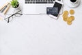 Concept of online payment with credit card with smart phone, laptop computer on office desk on clean bright marble table Royalty Free Stock Photo