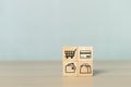Concept of online shopping. wooden cube blocks with shopping or e-commerce icons on table. business online marketing Royalty Free Stock Photo